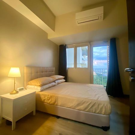 Апарт отель Park Mckinley West In Bgc Taguig Манила Экстерьер фото