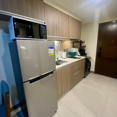 Апарт отель Park Mckinley West In Bgc Taguig Манила Экстерьер фото