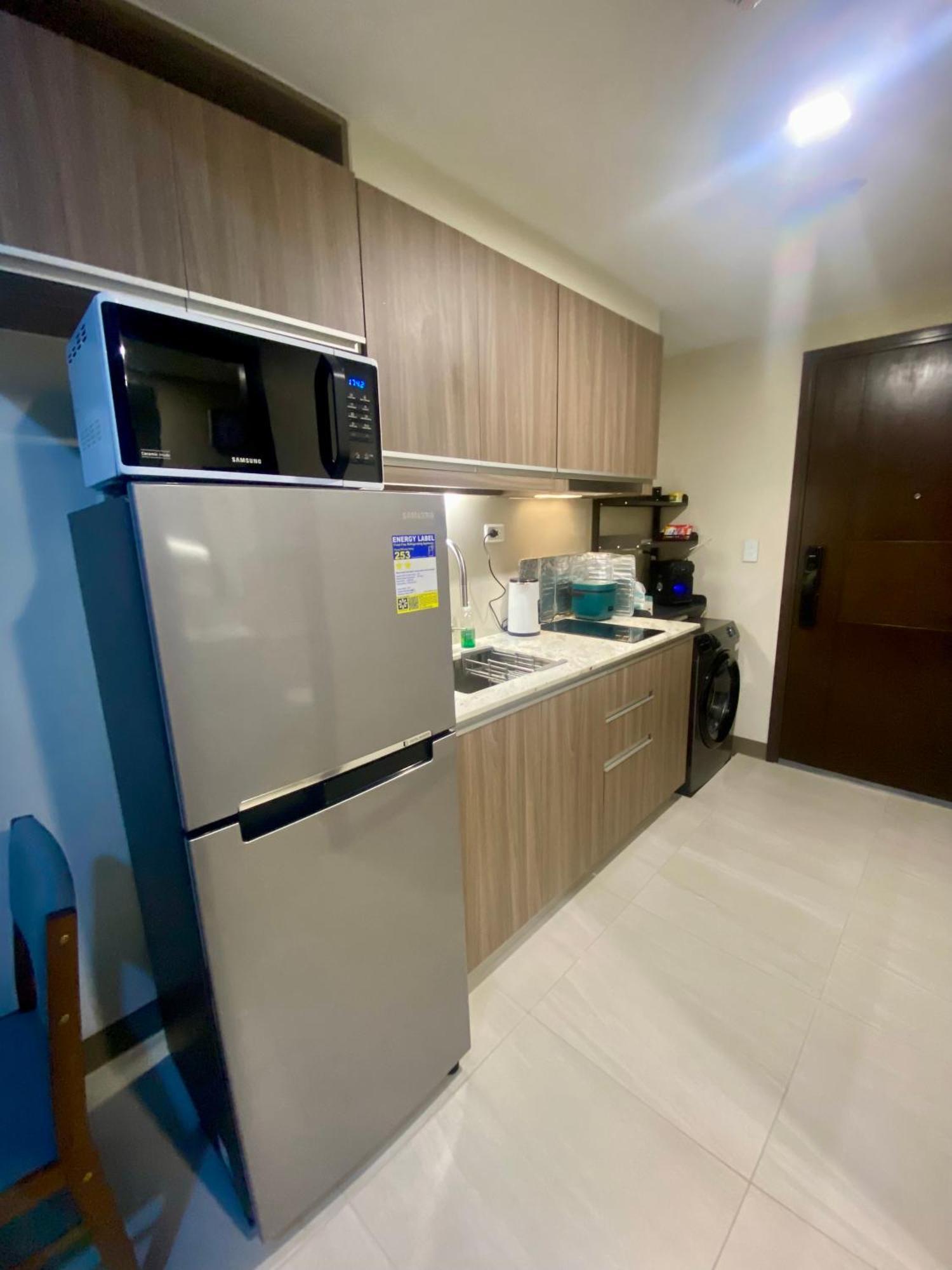 Апарт отель Park Mckinley West In Bgc Taguig Манила Экстерьер фото